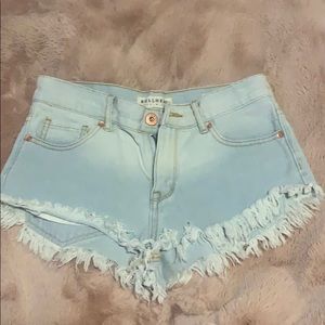 Distressed, light blue faded shorts